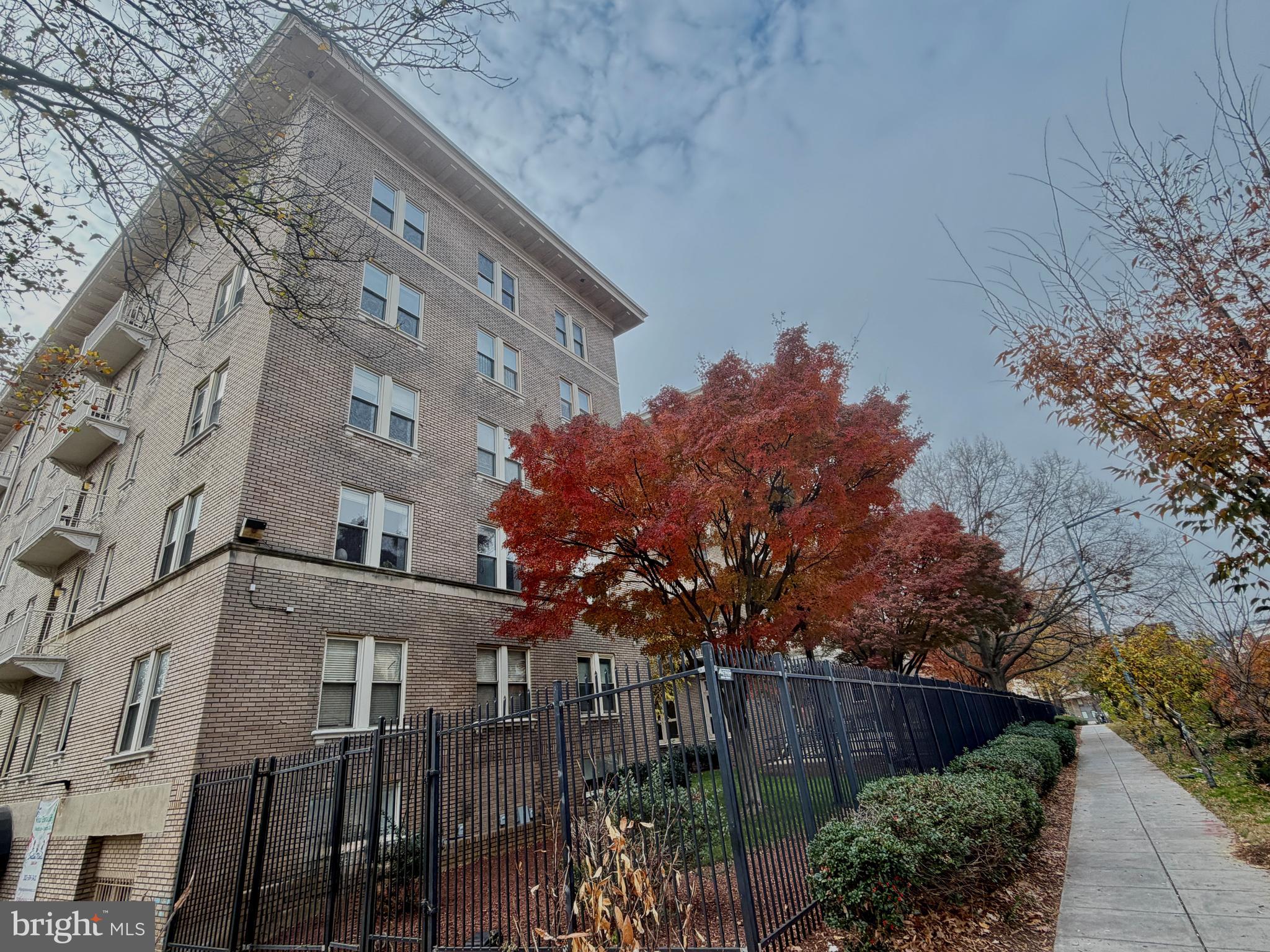 1308 Clifton Street Northwest, Unit 312 Washington, DC 20009 - Photo 2 of 28 Lovely landscaping surrounds the building