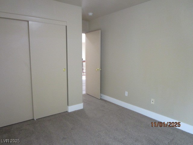 9014 Rutherford Grove Street Las Vegas, NV 89148 - Photo 17 of 22 Unfurnished bedroom with carpet and a closet