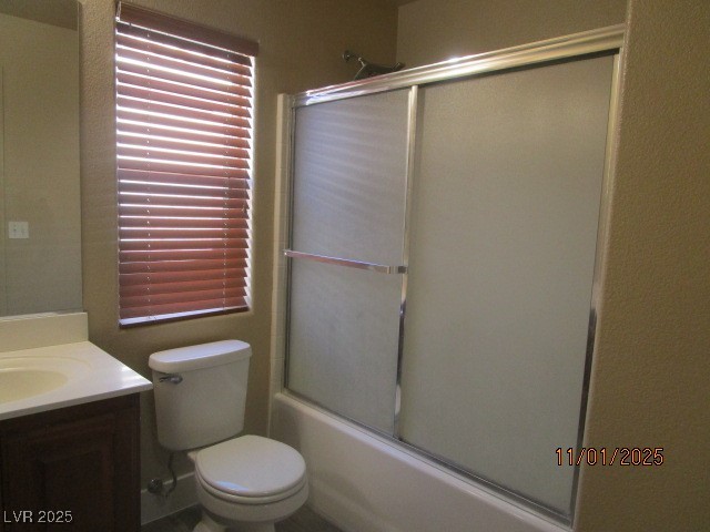 9014 Rutherford Grove Street Las Vegas, NV 89148 - Photo 19 of 22 Full bath with vanity and shower / bath combination with glass door
