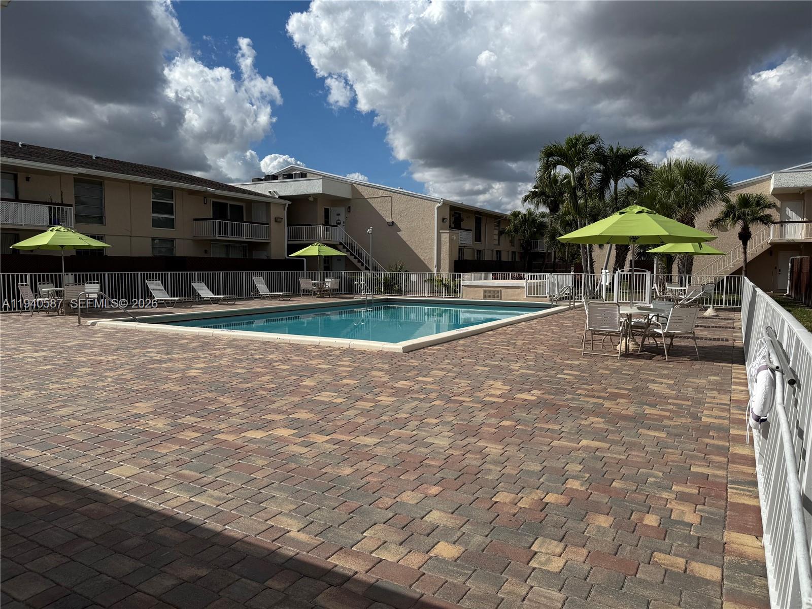 13783 Southwest 66th Street, Unit 203A Miami, FL 33183 - Photo 13 of 13 a view of a volley ball court