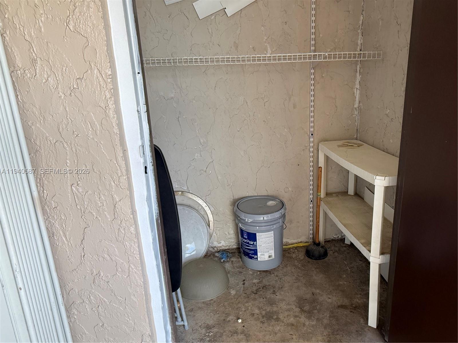 13783 Southwest 66th Street, Unit 203A Miami, FL 33183 - Photo 9 of 13 a bathroom with a sink and toilet