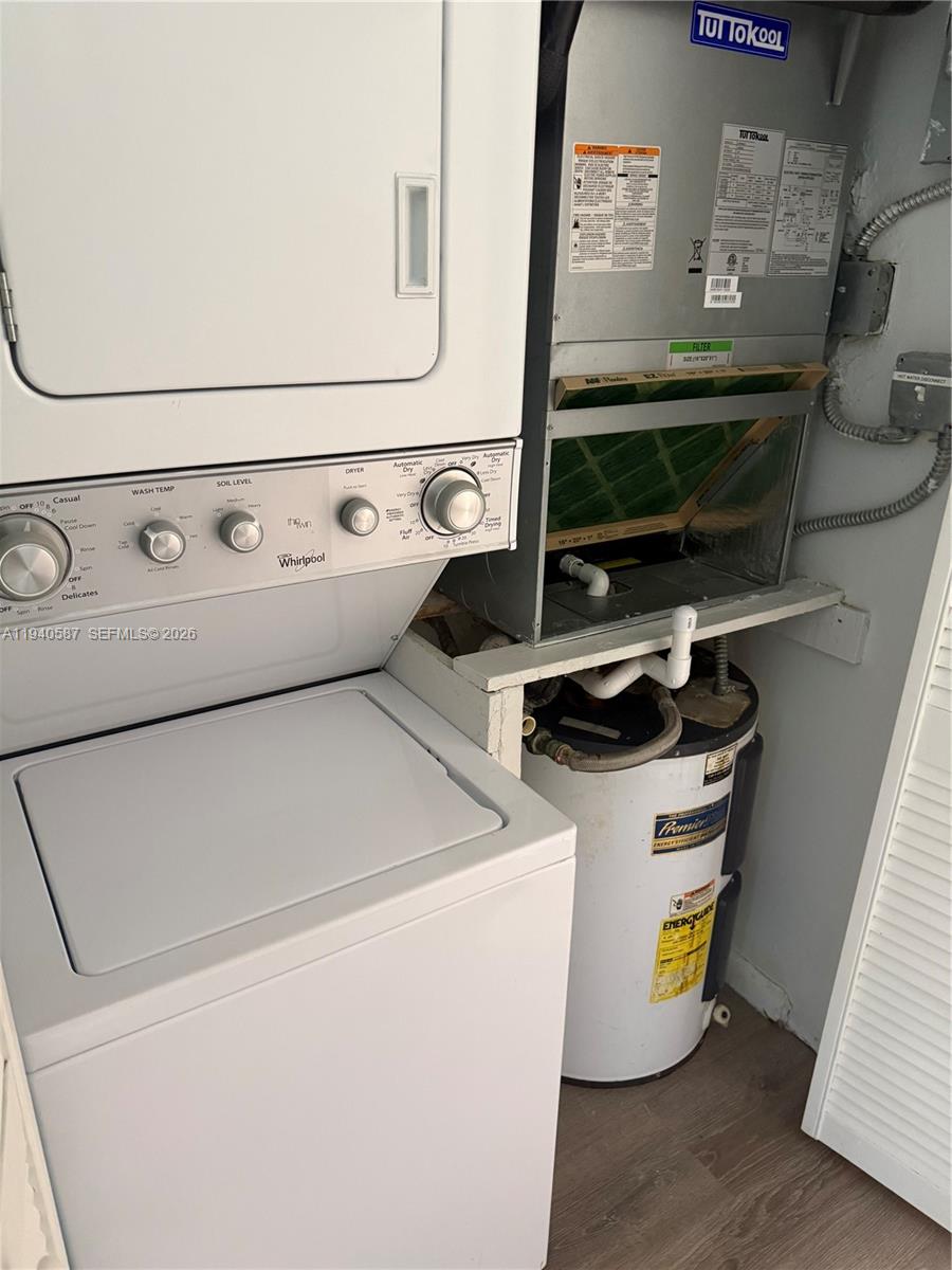 13783 Southwest 66th Street, Unit 203A Miami, FL 33183 - Photo 10 of 13 a utility room with dryer and washer