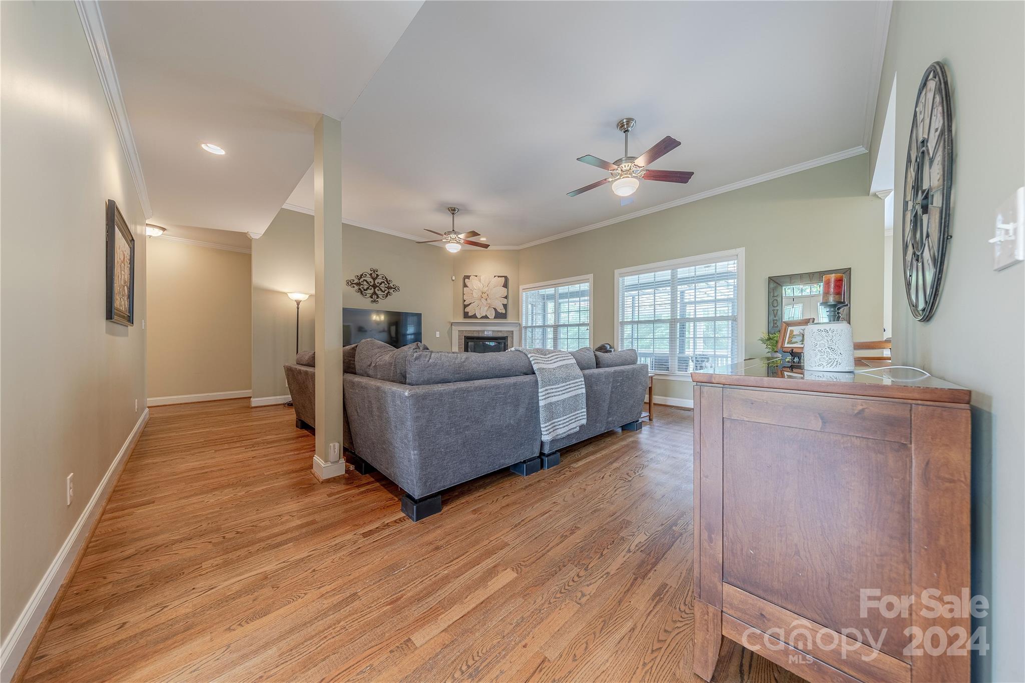 3321 Millstone Creek Road Lancaster, SC 29720 - Photo 11 of 48 a living room with furniture and a wooden floor