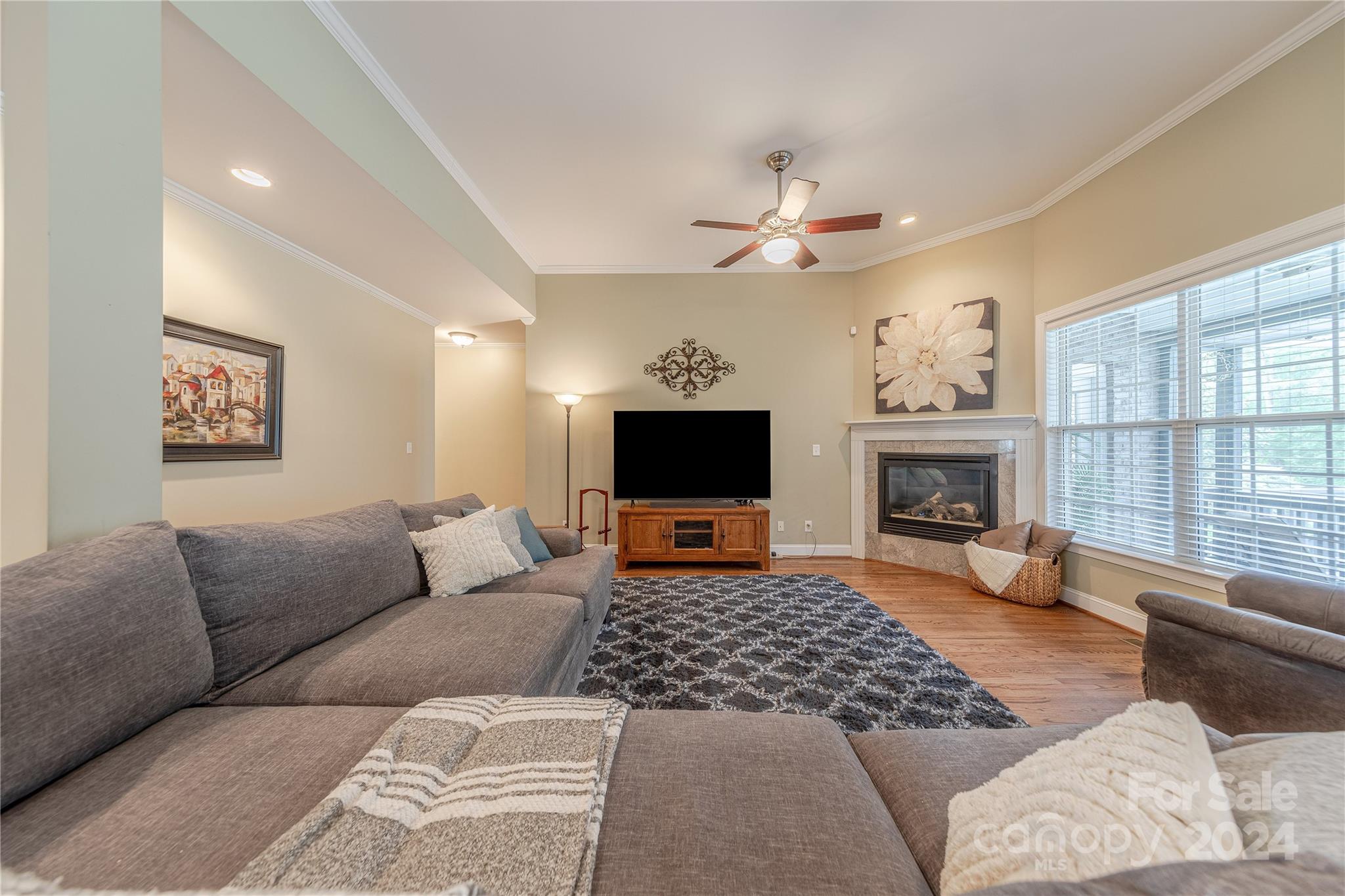 3321 Millstone Creek Road Lancaster, SC 29720 - Photo 13 of 48 a living room with furniture or couch and a fireplace