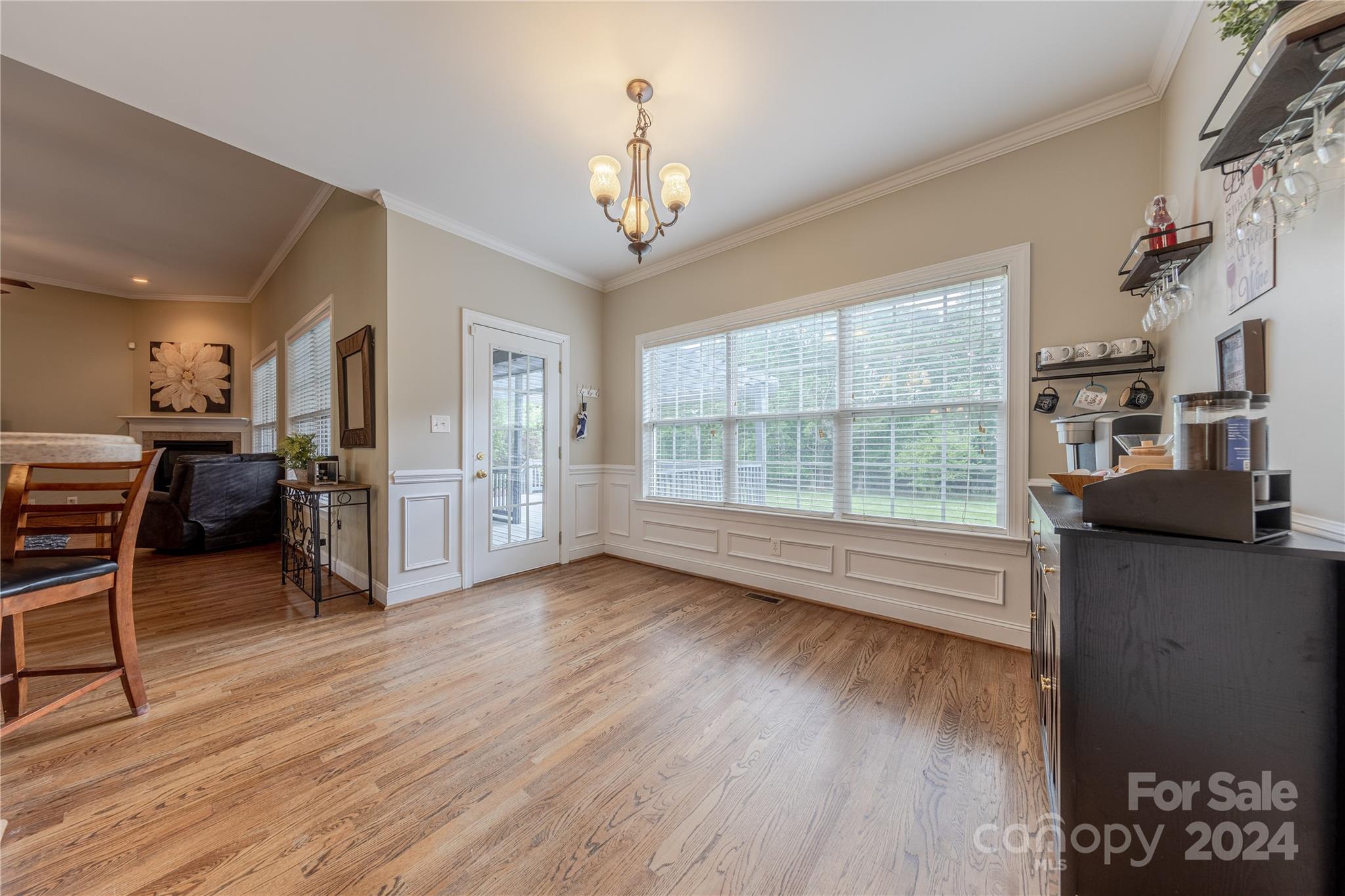 3321 Millstone Creek Road Lancaster, SC 29720 - Photo 21 of 48 a view of a livingroom with furniture hardwood floor and a large window