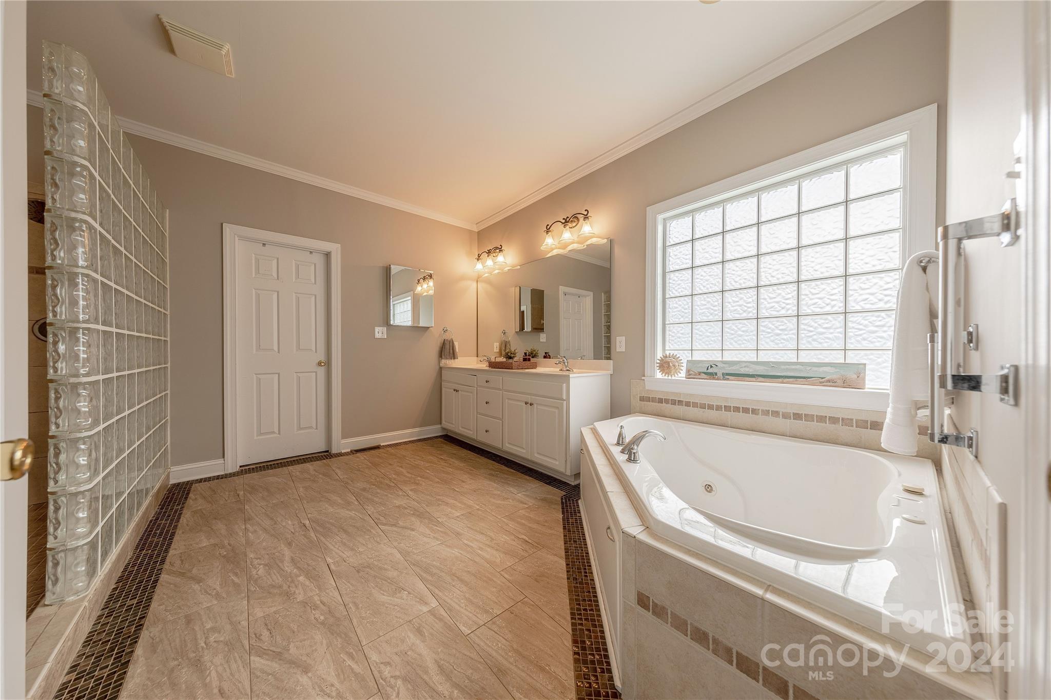 3321 Millstone Creek Road Lancaster, SC 29720 - Photo 26 of 48 a bathroom with a bathtub and a shower
