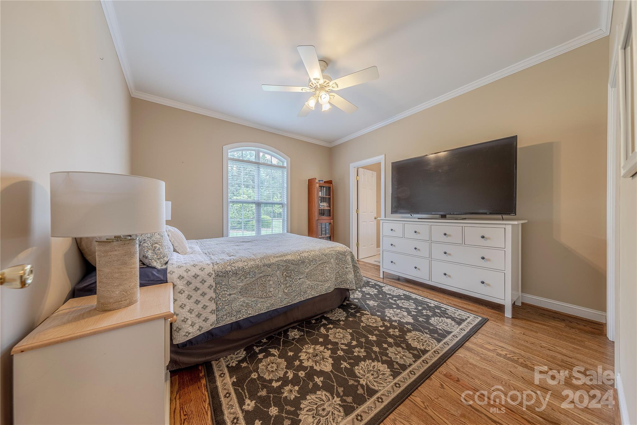 3321 Millstone Creek Road Lancaster, SC 29720 - Photo 30 of 48 a bedroom with a bed and flat screen tv