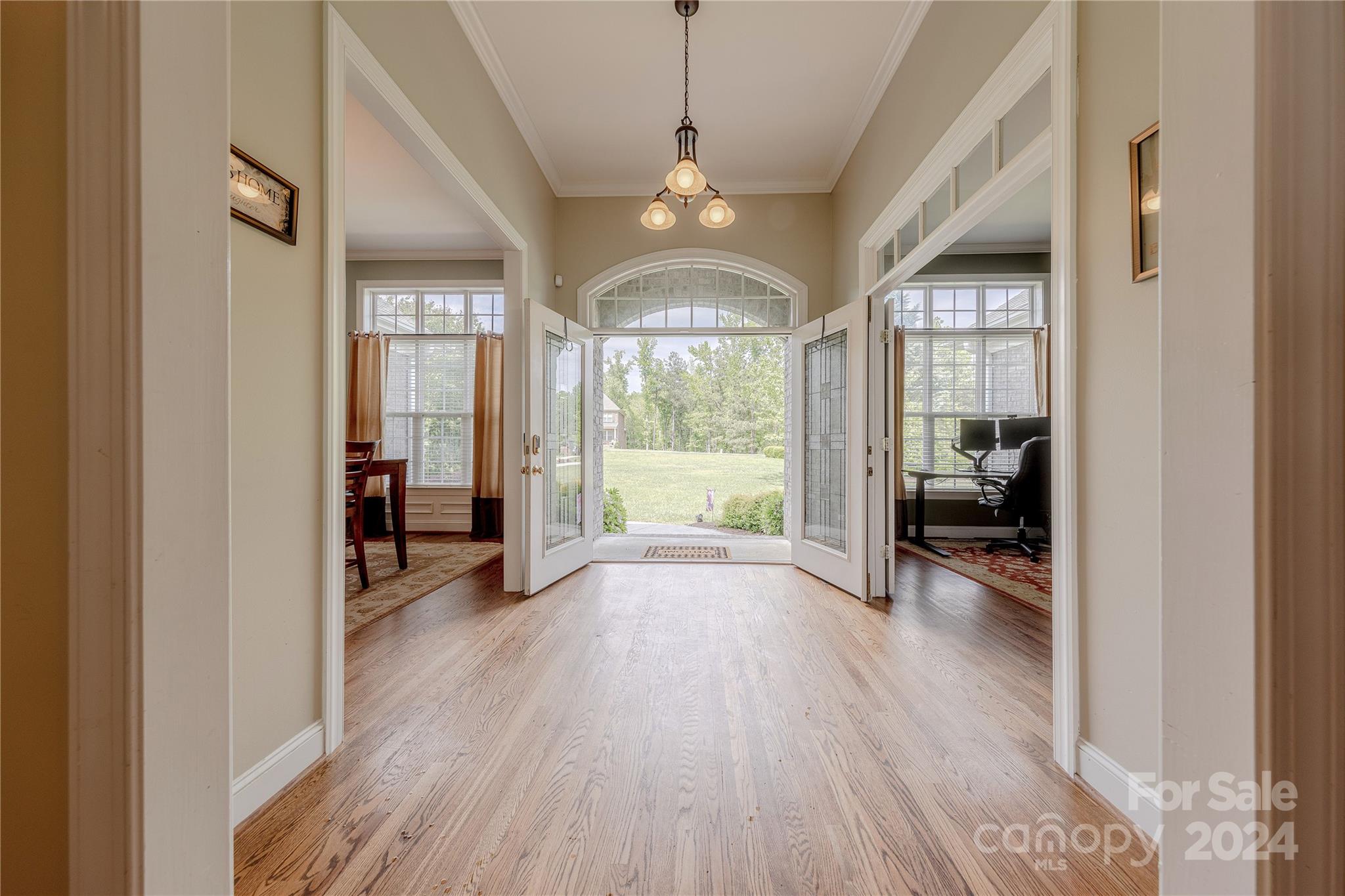 3321 Millstone Creek Road Lancaster, SC 29720 - Photo 4 of 48 a view of a room with wooden floor lounge chair and windows