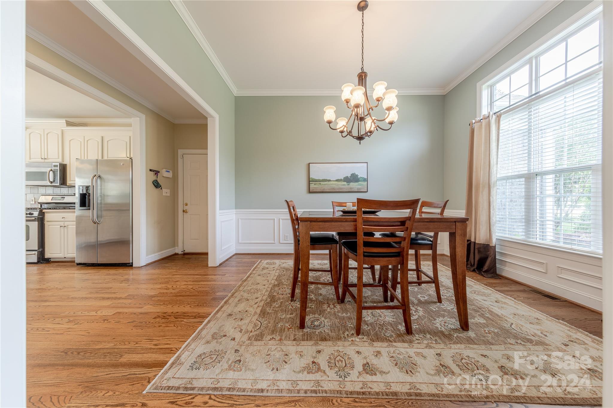 3321 Millstone Creek Road Lancaster, SC 29720 - Photo 6 of 48 a view of a dining room with furniture window and wooden floor