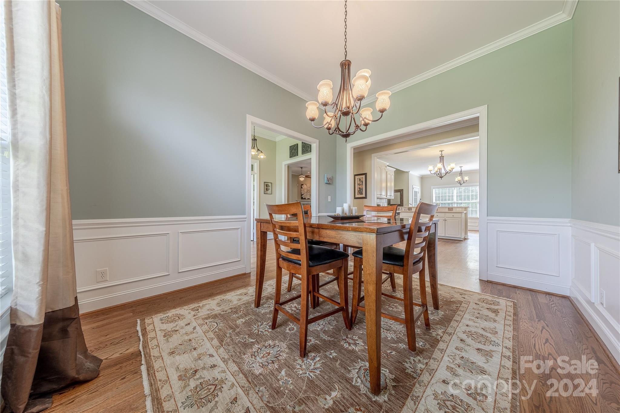 3321 Millstone Creek Road Lancaster, SC 29720 - Photo 7 of 48 a view of a dining room with furniture and chandelier