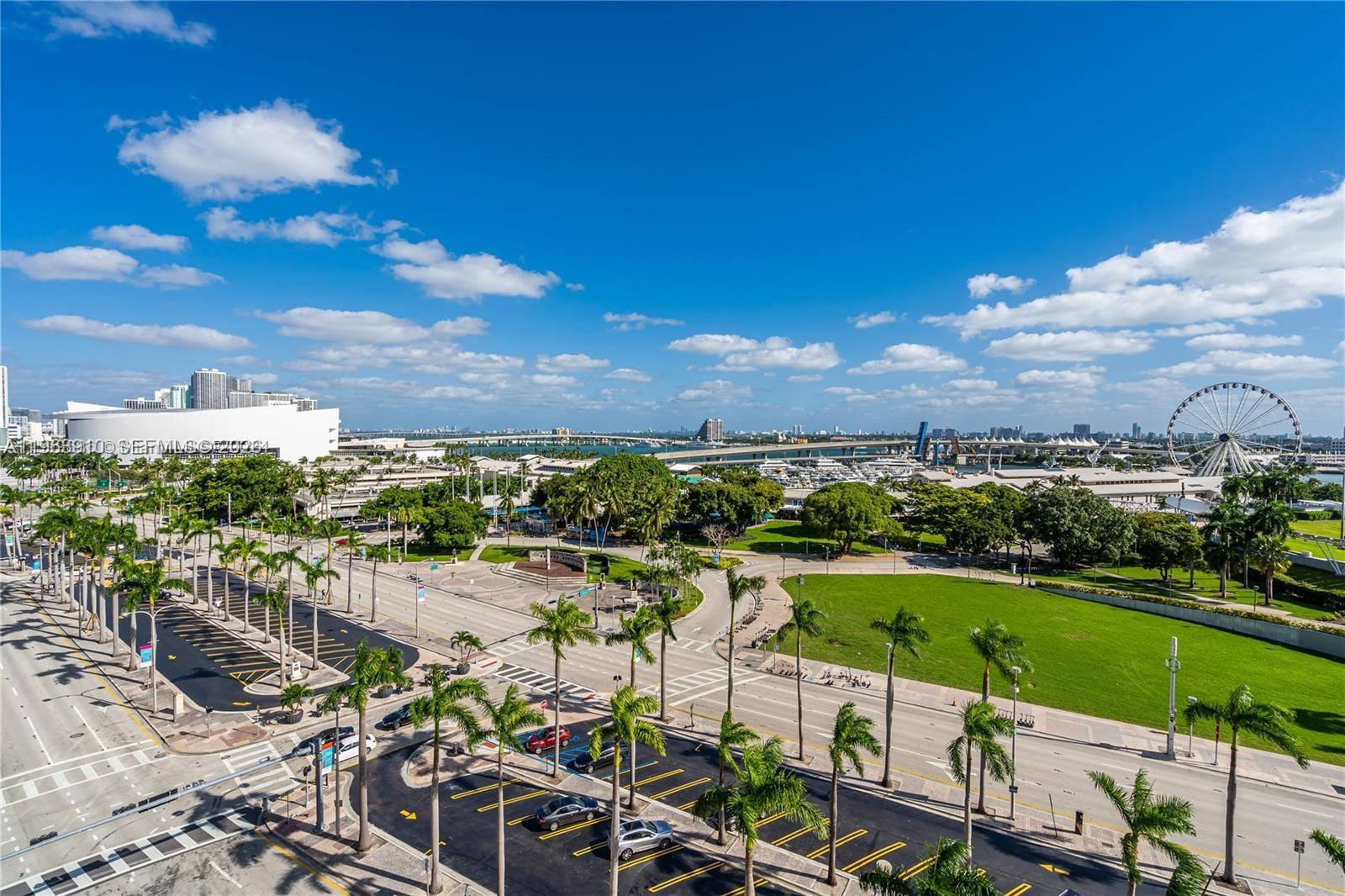 253 Northeast 2nd Street, Unit 433 Miami, FL 33132 - Photo 31 of 32 a view of a lake with a city