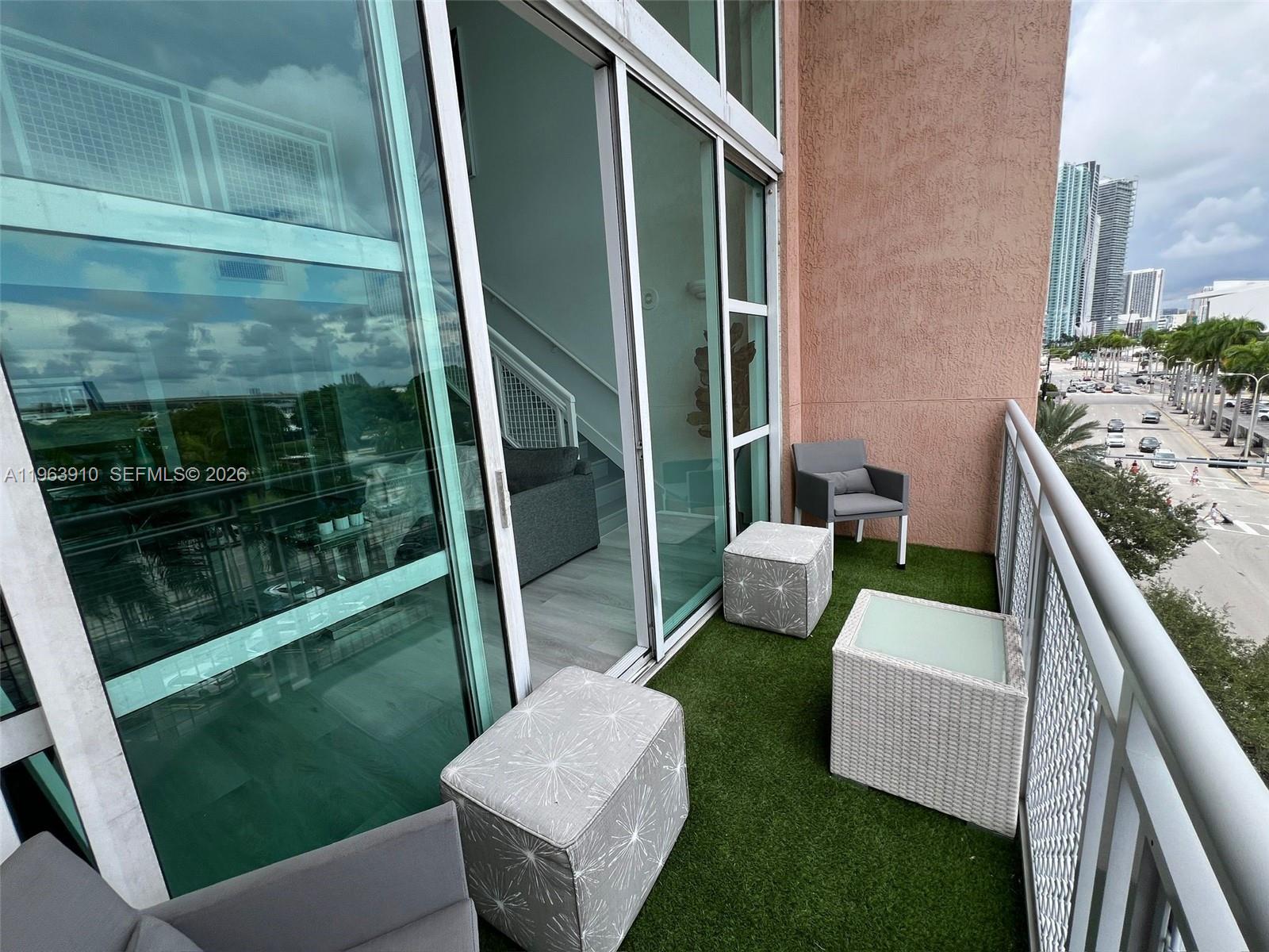 253 Northeast 2nd Street, Unit 433 Miami, FL 33132 - Photo 8 of 32 a view of a patio in the backyard