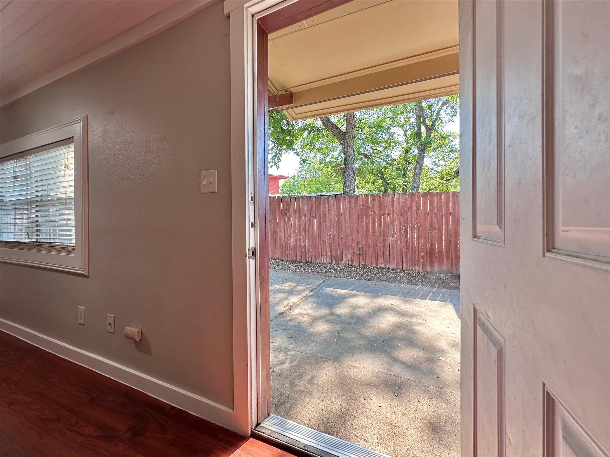 2103 East 16th Street, Unit ANNEX Austin, TX 78702 - Photo 3 of 23 a view of backyard with window and wooden floor