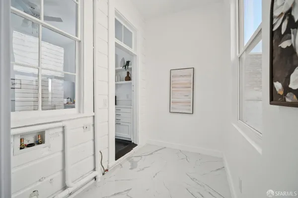 a view of a bathroom from the hallway