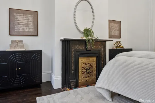 a bedroom with a bed and a table