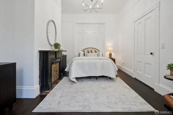 a picture of a bench in front of a wall