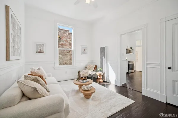 a kitchen with stainless steel appliances cabinets a sink and a stove