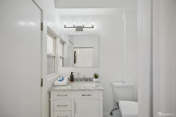 a view of walk in closet with window