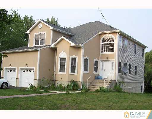 47 Westley Road Old Bridge, NJ 08857 - Photo 1 of 7 a front view of a house with a yard