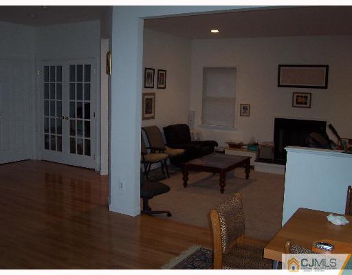 47 Westley Road Old Bridge, NJ 08857 - Photo 5 of 7 a living room with furniture and a window