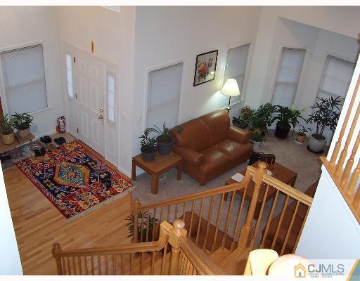 47 Westley Road Old Bridge, NJ 08857 - Photo 6 of 7 a living room with furniture and a rug