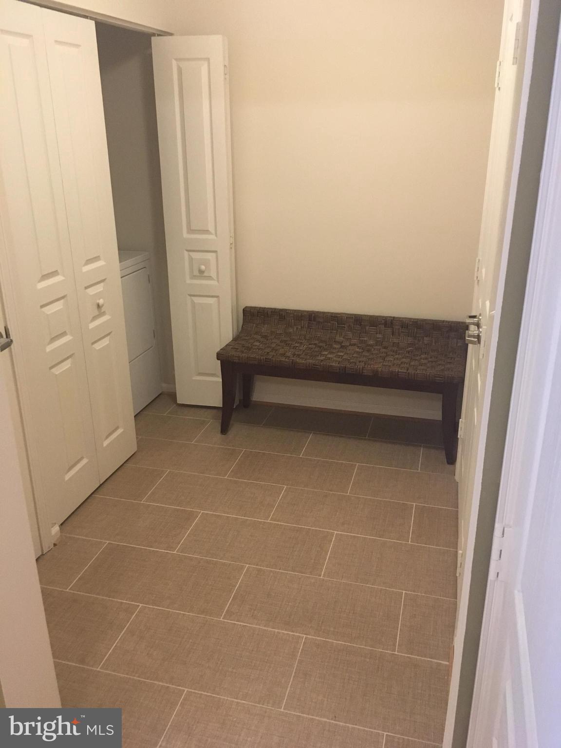 12000 Market Street, Unit 430 Reston, VA 20190 - Photo 14 of 24 a bathroom with a window and a shower