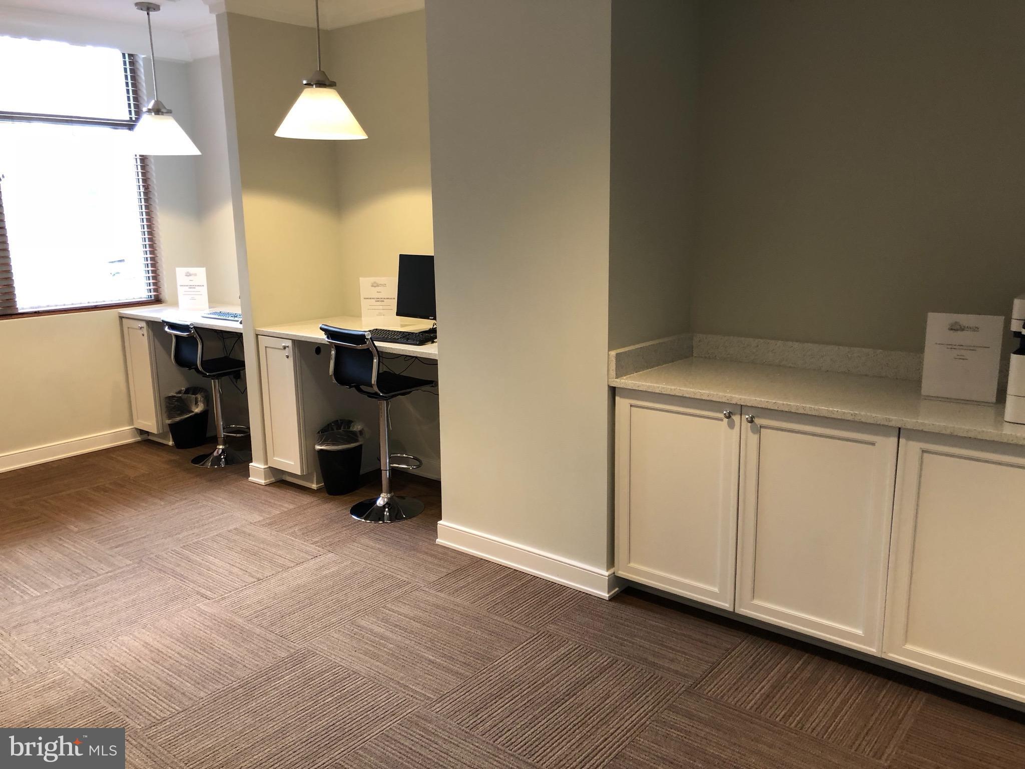 12000 Market Street, Unit 430 Reston, VA 20190 - Photo 18 of 24 a view of a room with furniture and a fireplace