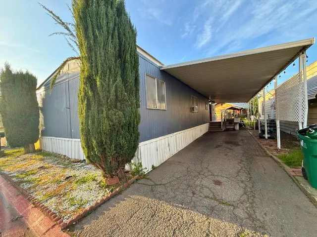 a view of backyard of a house