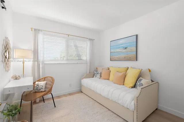 a living room with a couch and a table