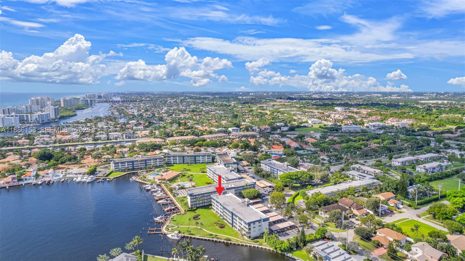 3301 Spanish Trail, Unit 207 Delray Beach, FL 33483 - Photo 33 of 38 an aerial view of a residential houses with outdoor space