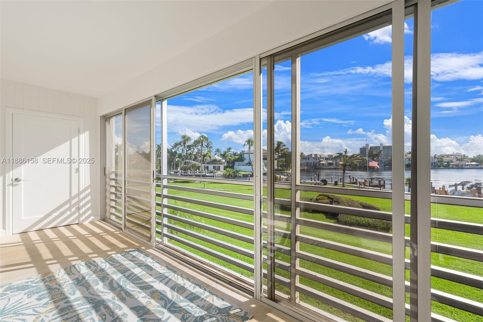 3301 Spanish Trail, Unit 207 Delray Beach, FL 33483 - Photo 7 of 38 a view of a city from a living room
