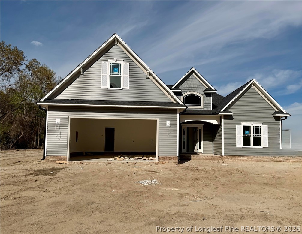 1744 Alderman Mill Road Dunn, NC 28334 - Photo 1 of 3 a front view of a house with yard