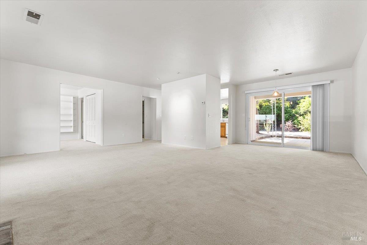 417 Deerfield Circle Santa Rosa, CA 95409 - Photo 11 of 48 Looking from the fireplace to the kitchen and backyard.