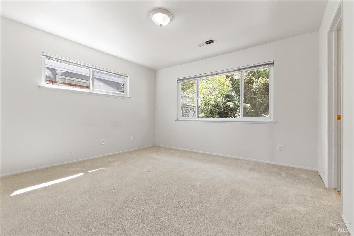 417 Deerfield Circle Santa Rosa, CA 95409 - Photo 24 of 48 Primary bedroom looking to the backyard.