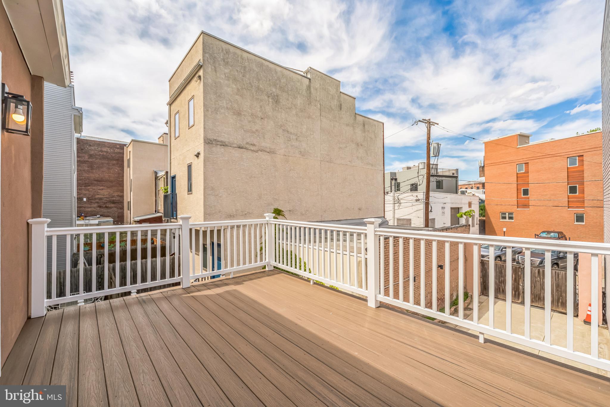 2123 East Norris Street Philadelphia, PA 19125 - Photo 17 of 40 a view of a balcony with wooden floor