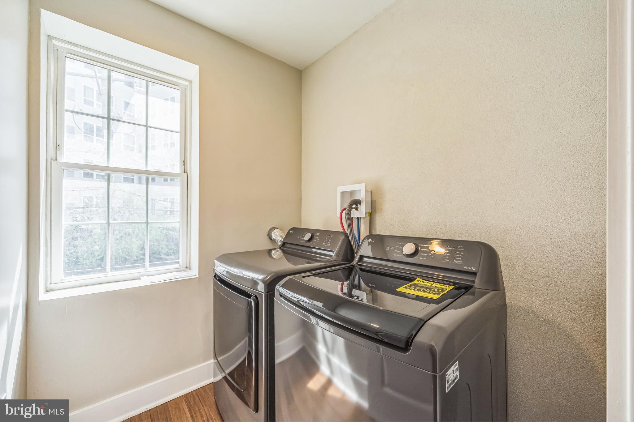 2123 East Norris Street Philadelphia, PA 19125 - Photo 21 of 40 a room with a stove and a window