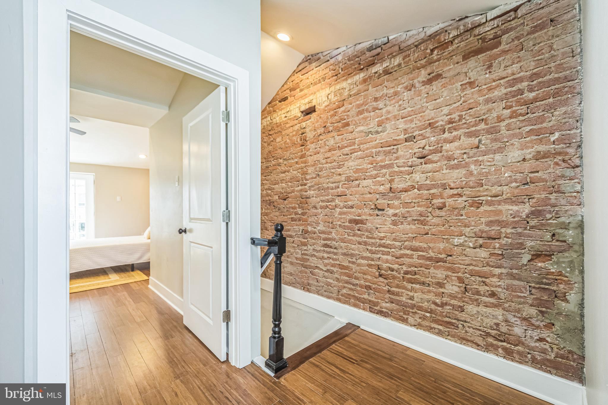 2123 East Norris Street Philadelphia, PA 19125 - Photo 22 of 40 a view of a bathroom from a hallway