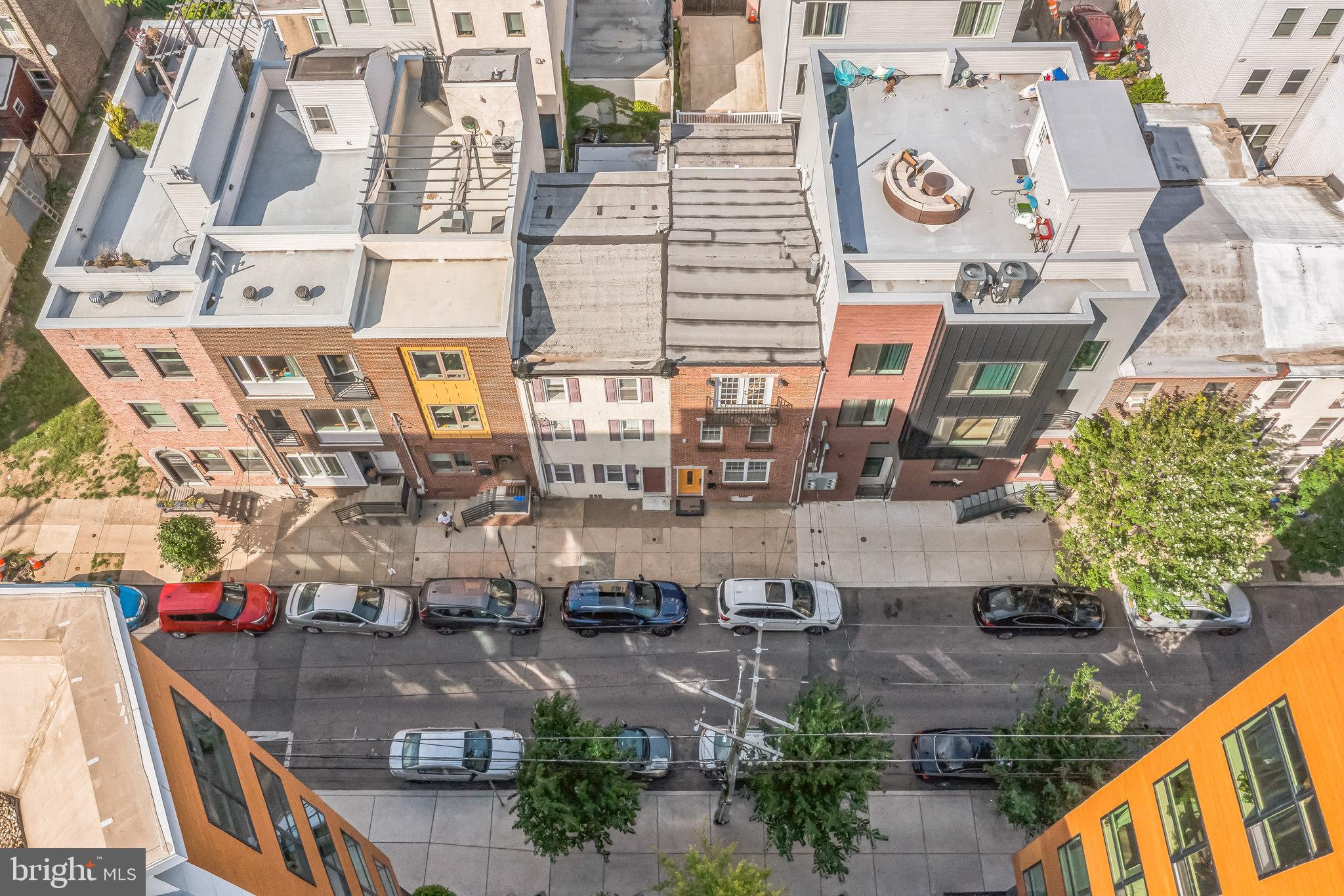 2123 East Norris Street Philadelphia, PA 19125 - Photo 39 of 40 an aerial view of residential building and parking