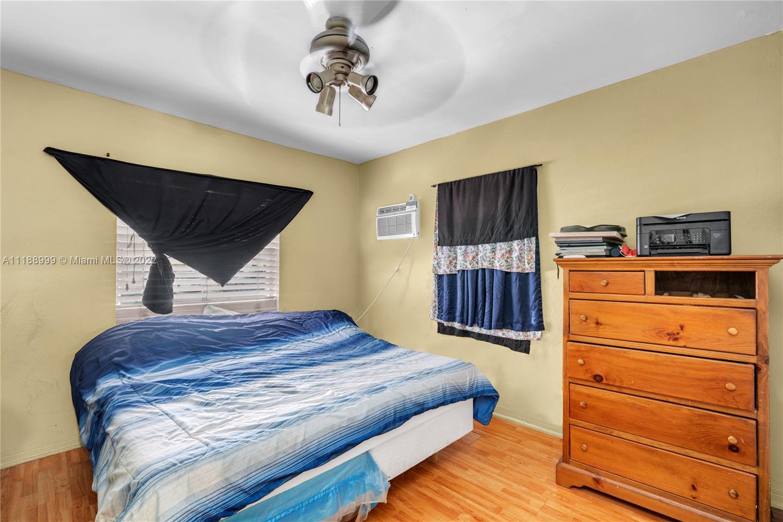 2800 Southwest 25th Street Miami, FL 33133 - Photo 14 of 19 a bedroom with a bed and furniture