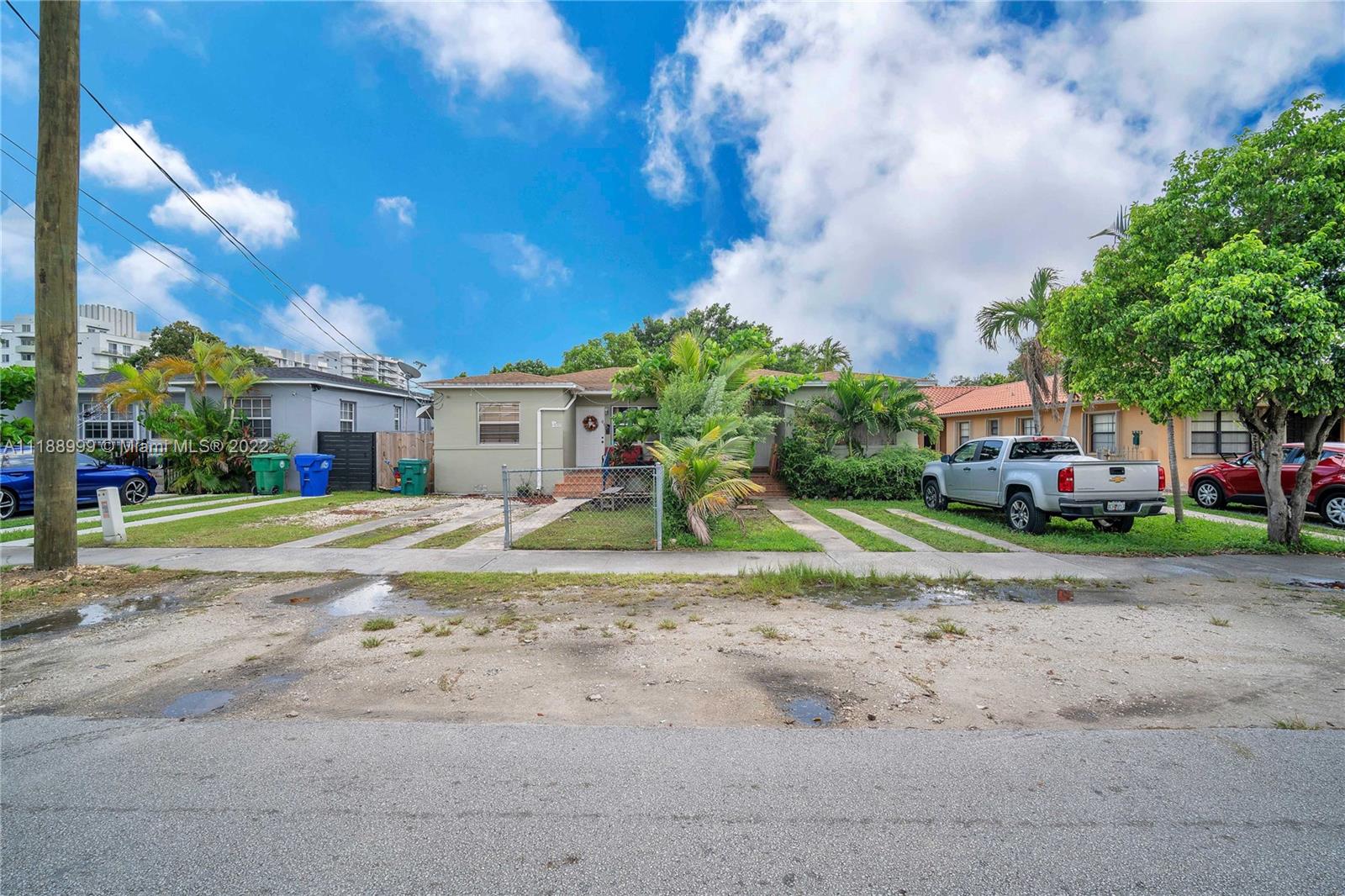 2800 Southwest 25th Street Miami, FL 33133 - Photo 16 of 19 a view of a house with a yard and plants
