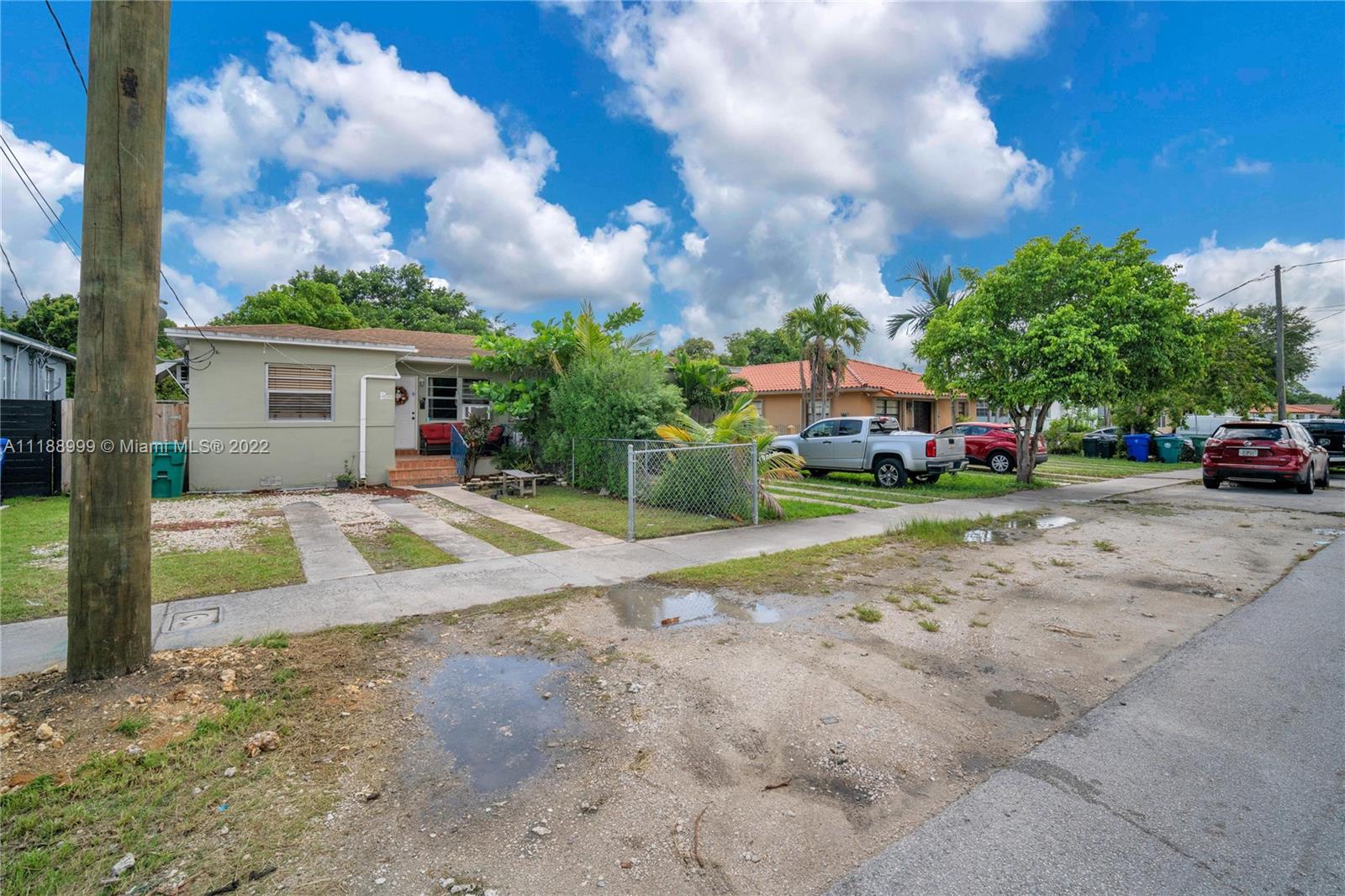 2800 Southwest 25th Street Miami, FL 33133 - Photo 19 of 19 a view of house with outdoor space and car parked