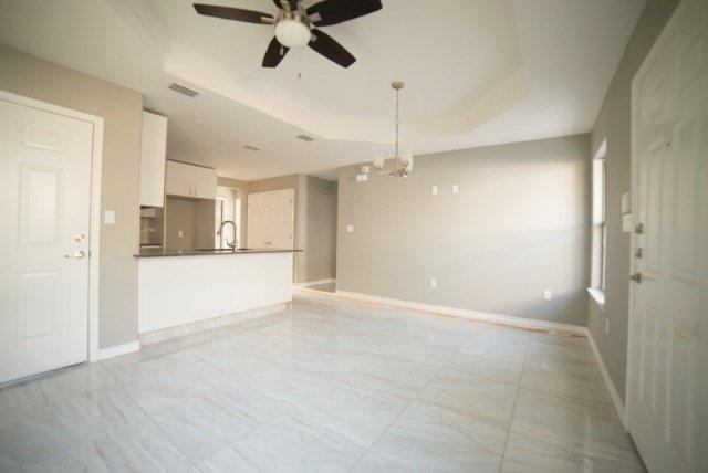1310 West Harrison Avenue, Unit 2 Alton, TX 78573 - Photo 3 of 11 a view of an empty room and kitchen view