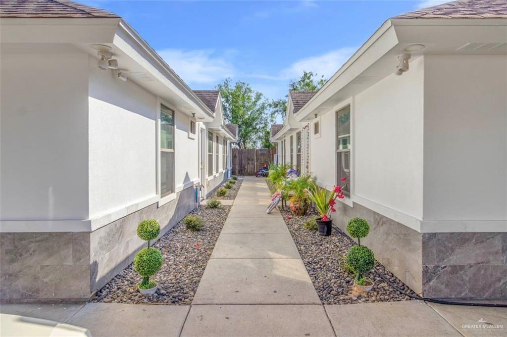 1310 West Harrison Avenue, Unit 2 Alton, TX 78573 - Photo 9 of 11 a view of a pathway with house