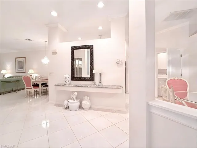 $690,000 | 8854 Naples Heritage Drive, Unit E1, Naples, FL 34112