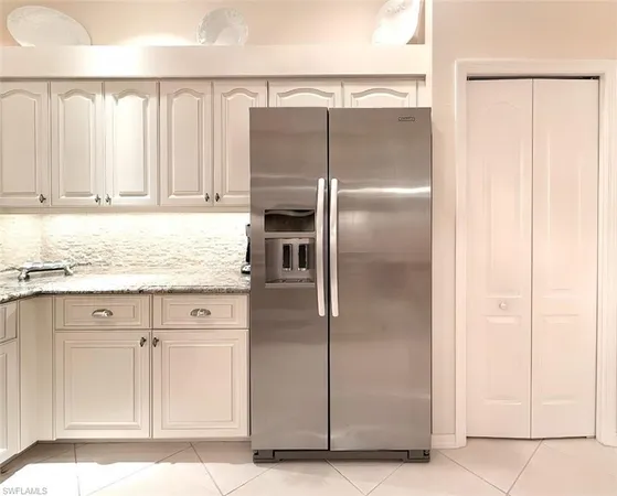 $599,000 | 8854 Naples Heritage Drive, Naples, FL 34112