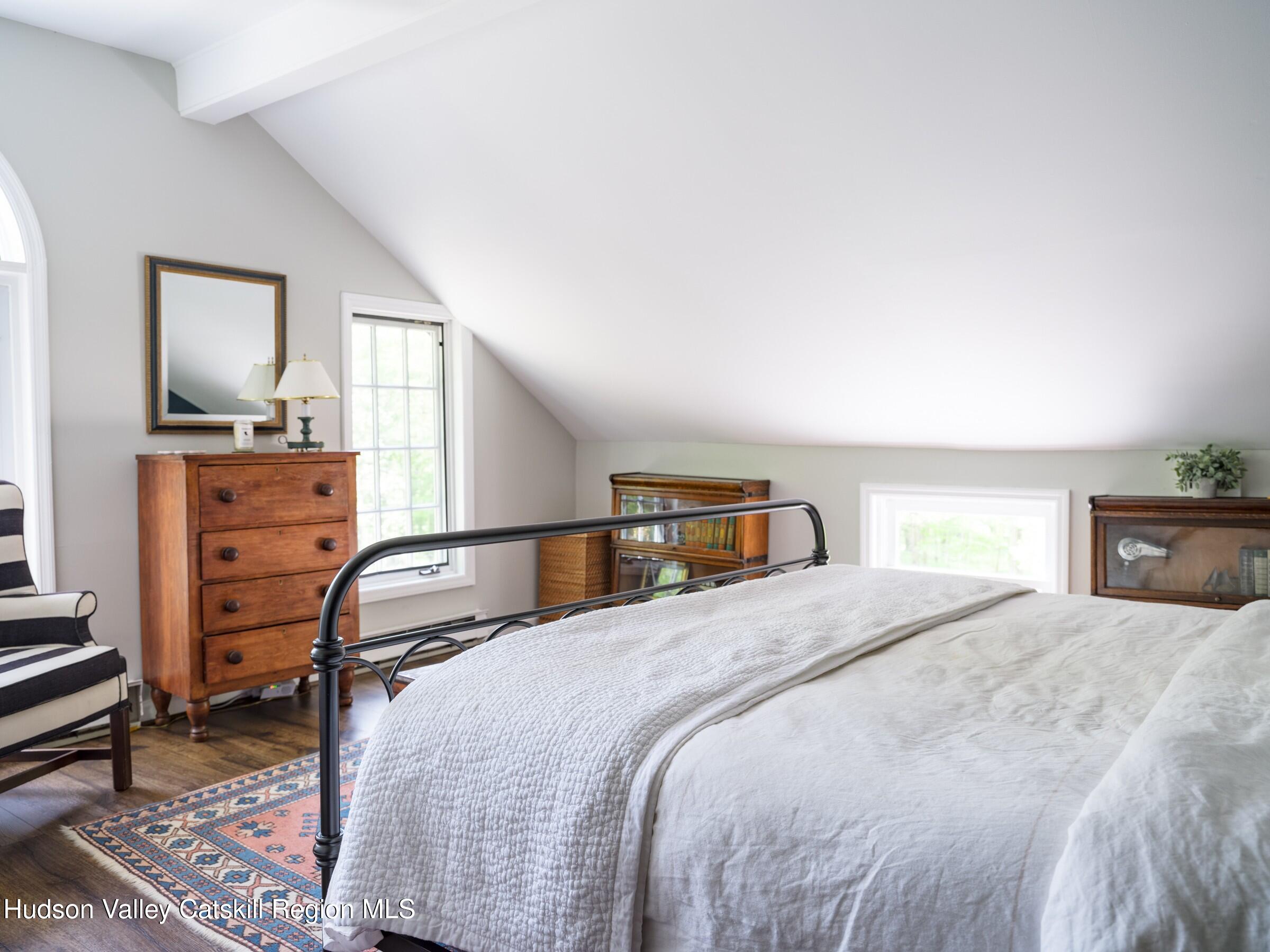 271 Texas Hill Road Hillsdale, NY 12521 - Photo 19 of 29 a bedroom with a bed and dresser