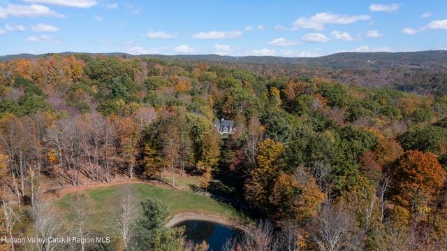a view of lake and mountain