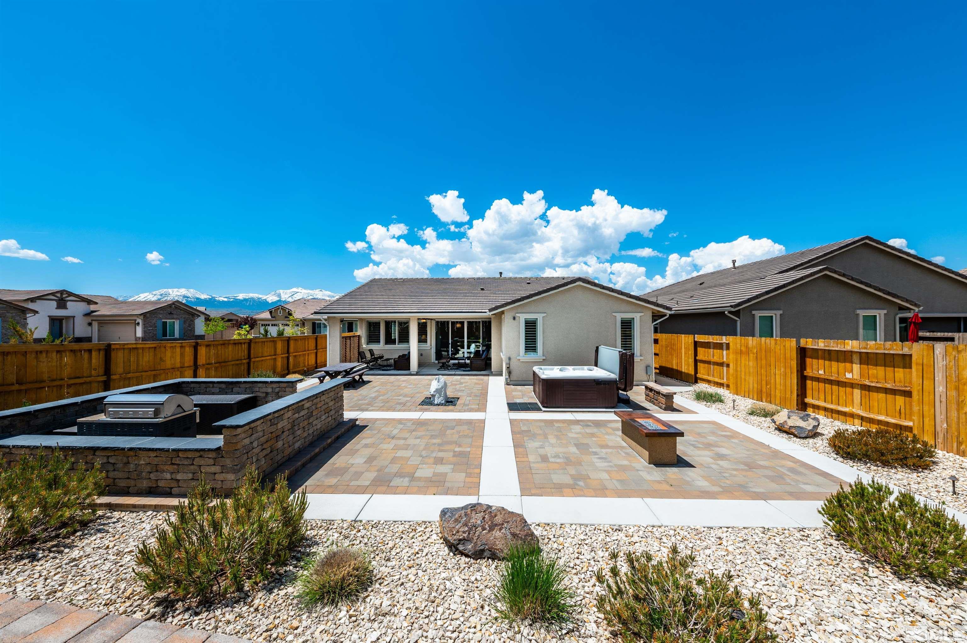9860 Nahar Lane Reno, NV 89521 - Photo 29 of 40 a front view of a house with a yard