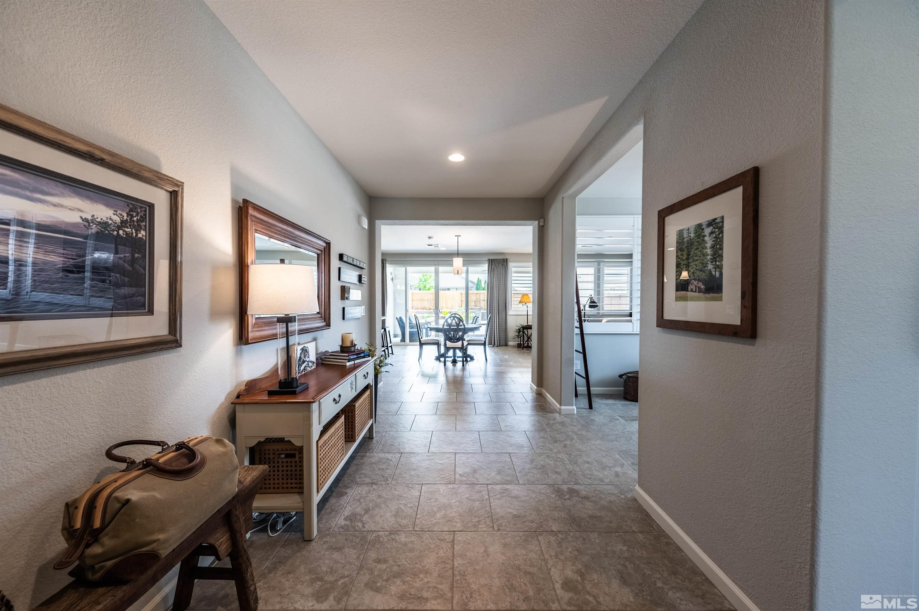 9860 Nahar Lane Reno, NV 89521 - Photo 5 of 40 a lobby with furniture and floor to ceiling window