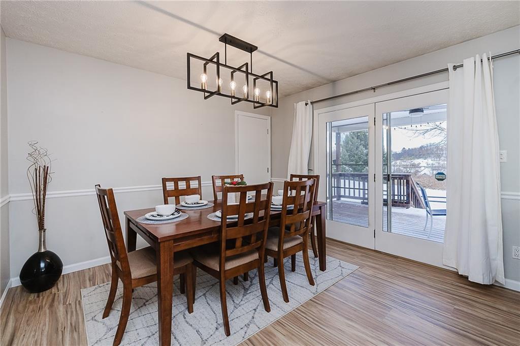979 Barclay Road Indiana, PA 15701 - Photo 13 of 32 a view of a dining room with furniture wooden floor and chandelier